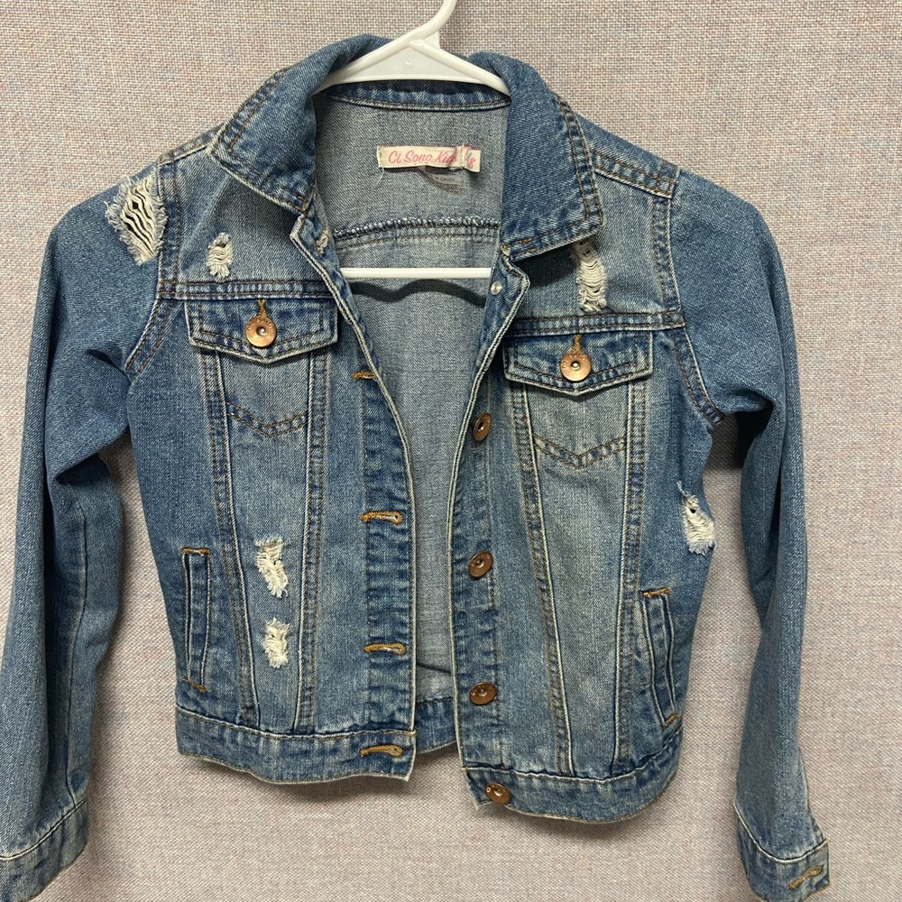 Distressed denim jacket